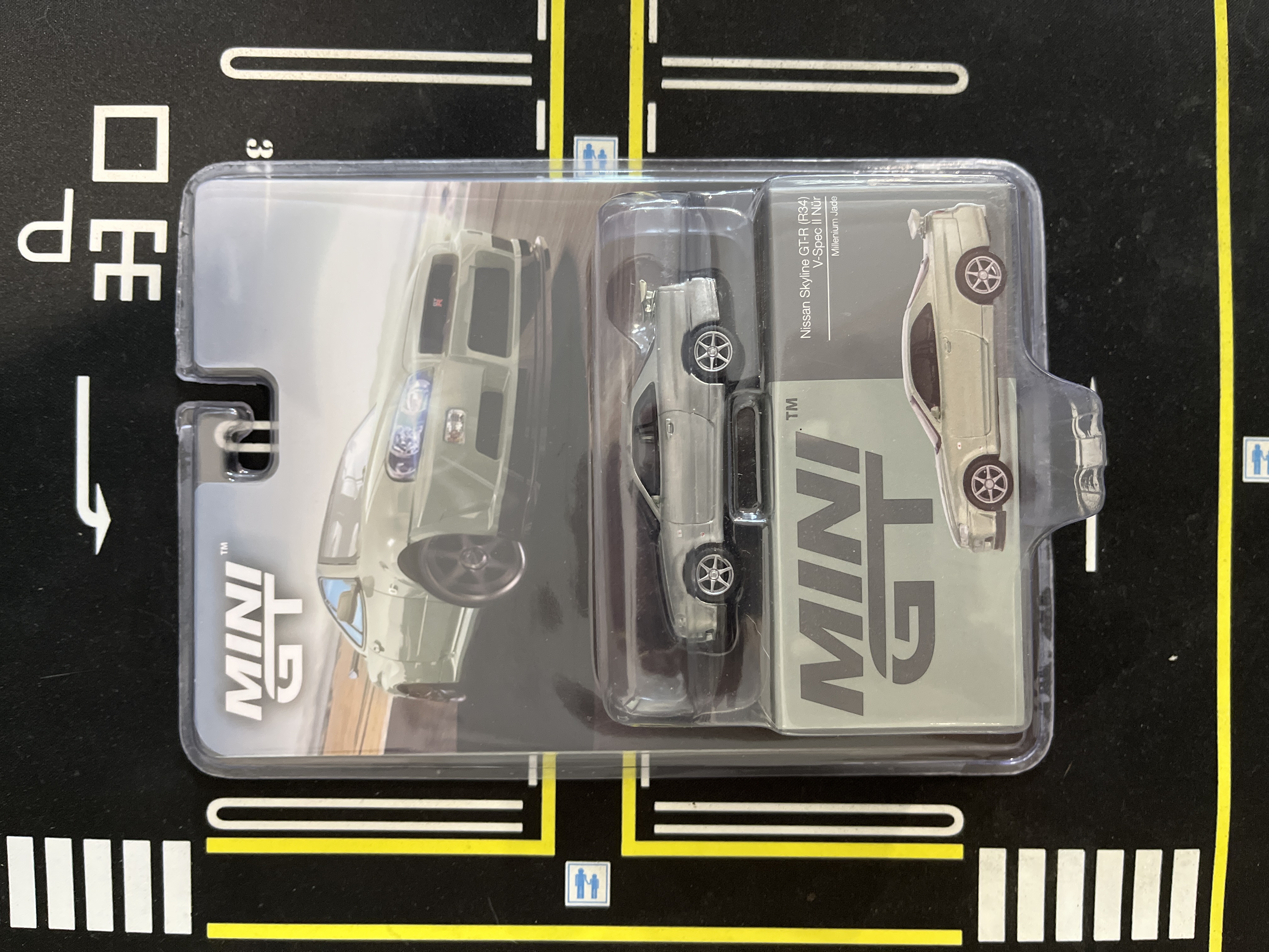 MGT01003 BL - MiniGT 1003 Nissan Skyline GT-R ( R34 ) V-Spec II Nur Millenium Jade Chase Car ( Sealed )